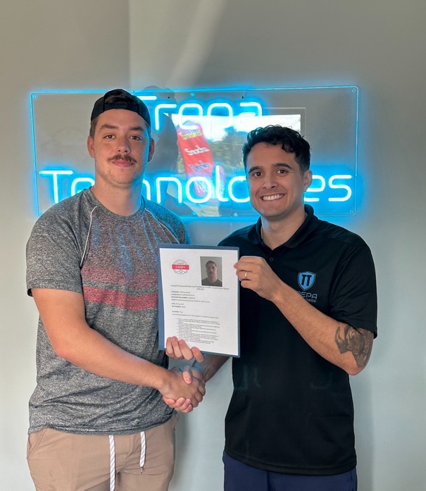 Student with their certificate and exam results